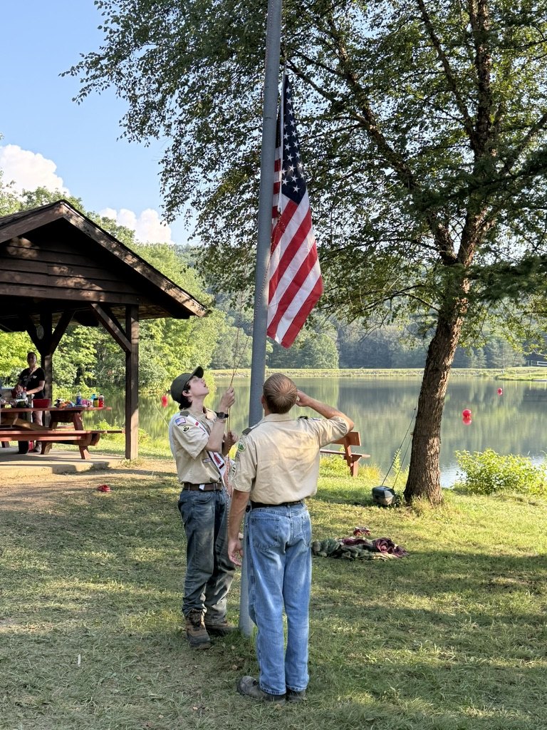 Scouts raising the flag